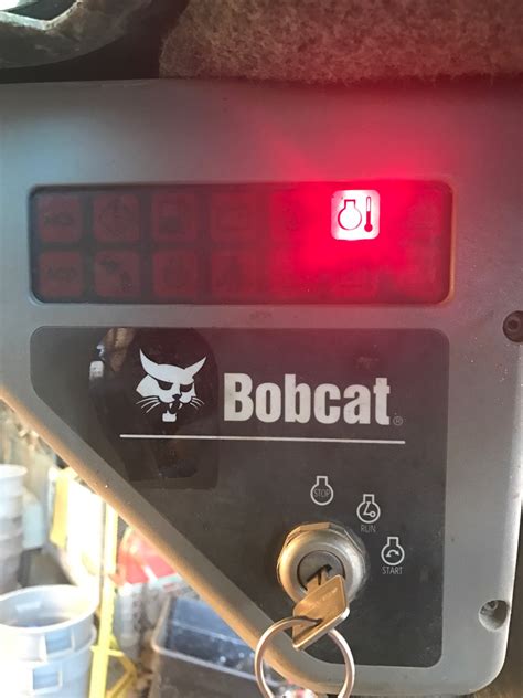 bobcat s130 warning lights